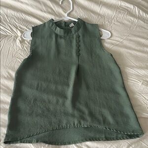 Green Sleeveless Blouse with High Neckline